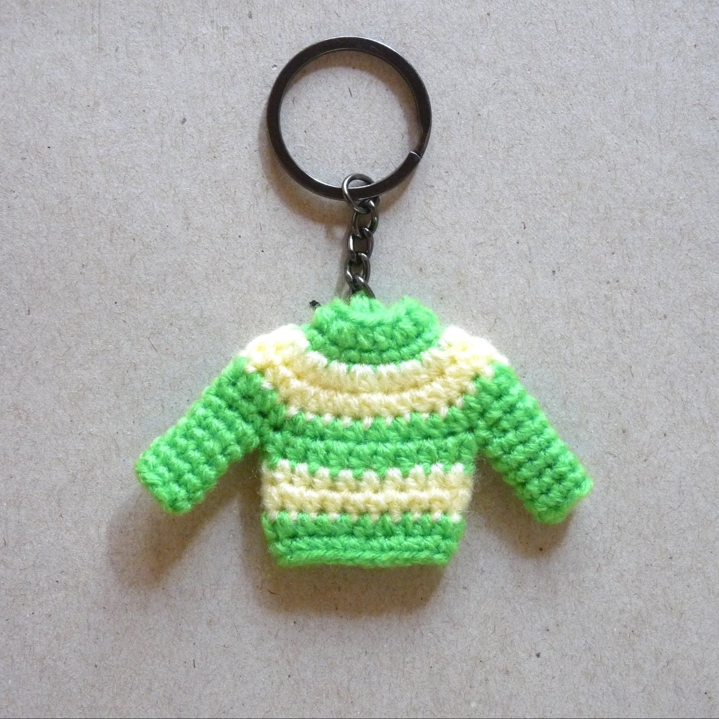 green and yellow crochet sweater keychain