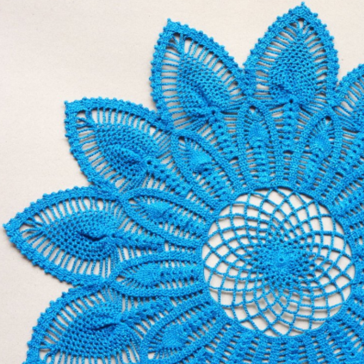 Handmade large blue flower shaped crochet doily