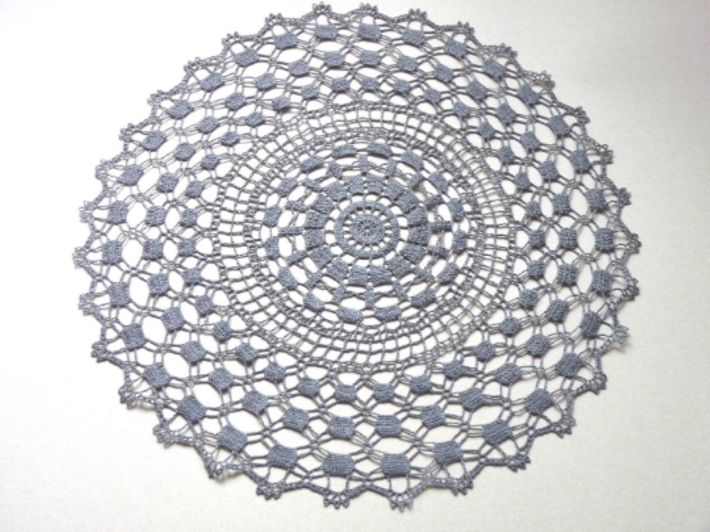 large round grey crochet lace centerpiece, doily