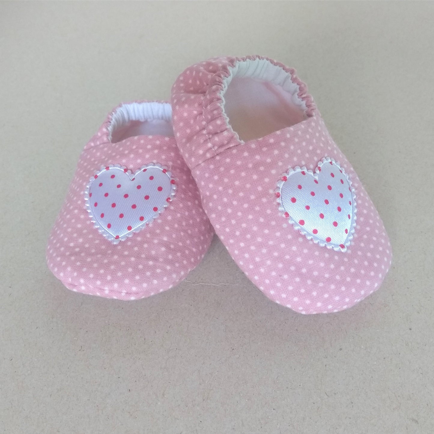 handmade baby shoes, made from cotton fabric with soft soles and heart appliques, for 0 to 3 months babies