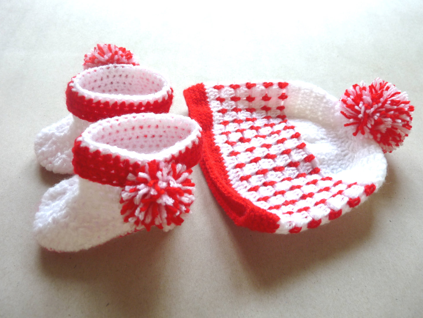 red and white crochet baby hat and booties set