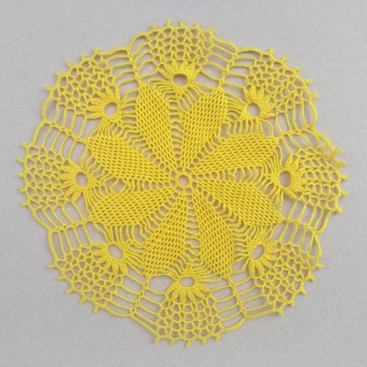 hand crocheted small round yellow doily