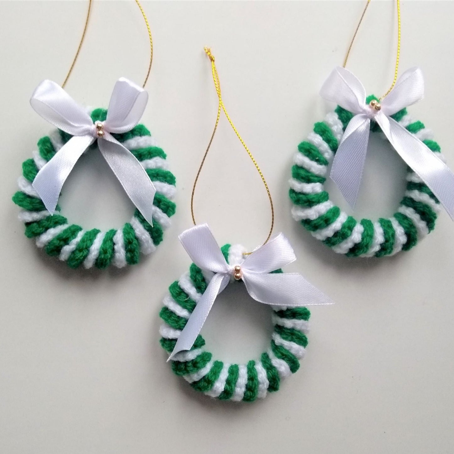 green and white crochet Christmas tree ornaments, set of 3 candy cane wreaths