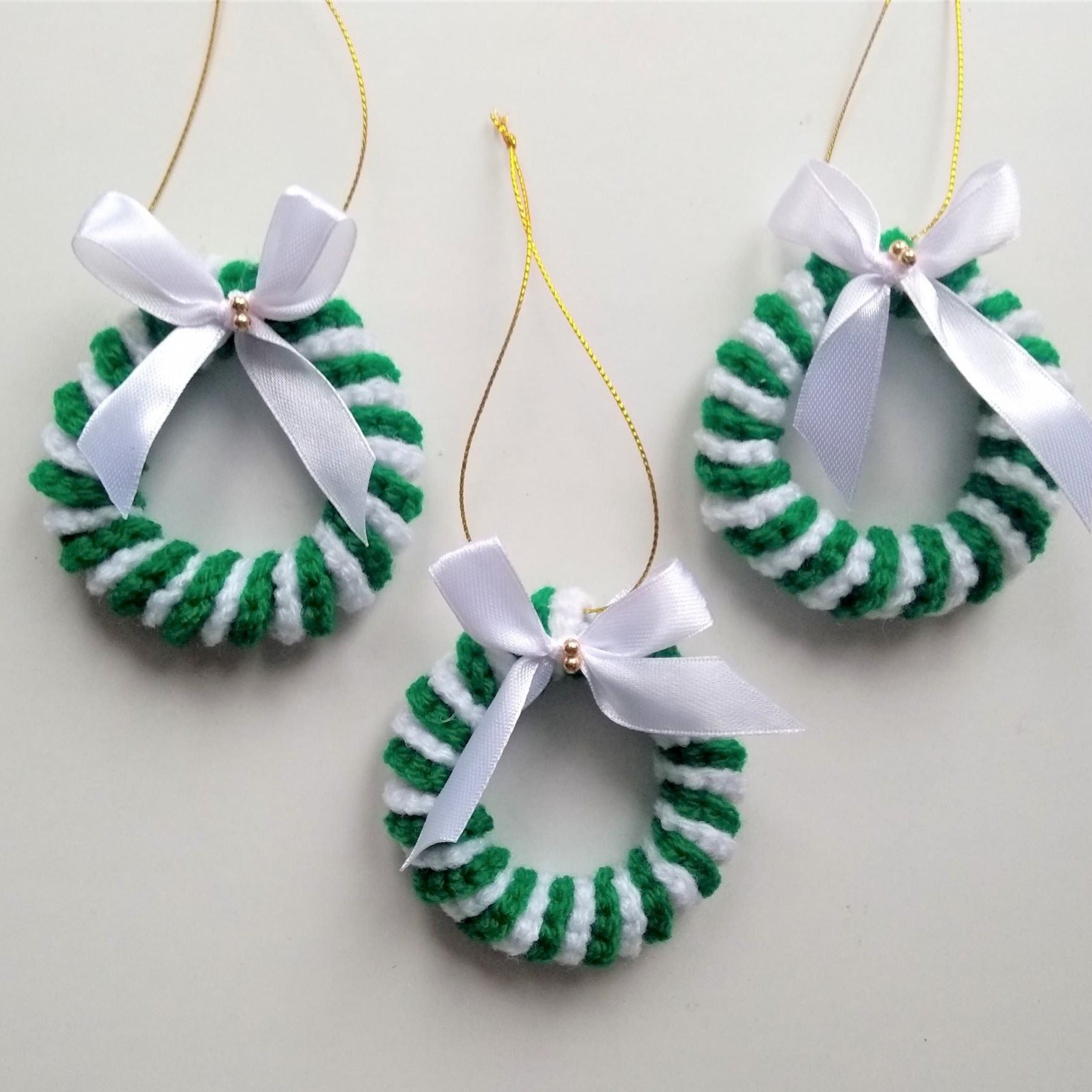 green and white crochet Christmas tree ornaments, set of 3 candy cane wreaths