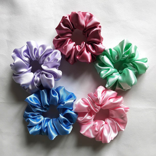satin scrunchies, in a set of 5, the colors are light purple, light blue, light pink, light green and dusky pink