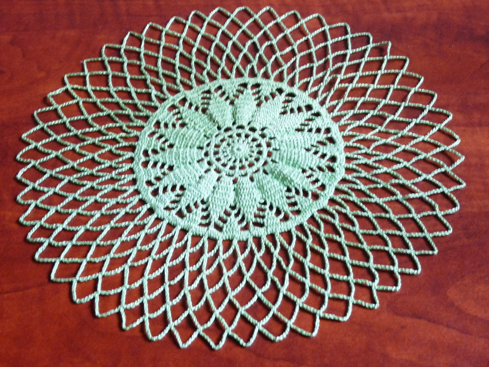 light green handmade small round crochet lace doily