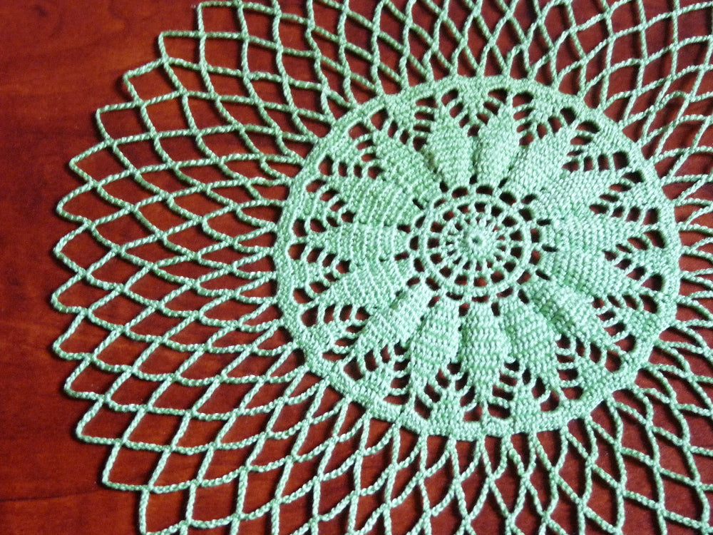 handmade light green small round crochet lace doilly