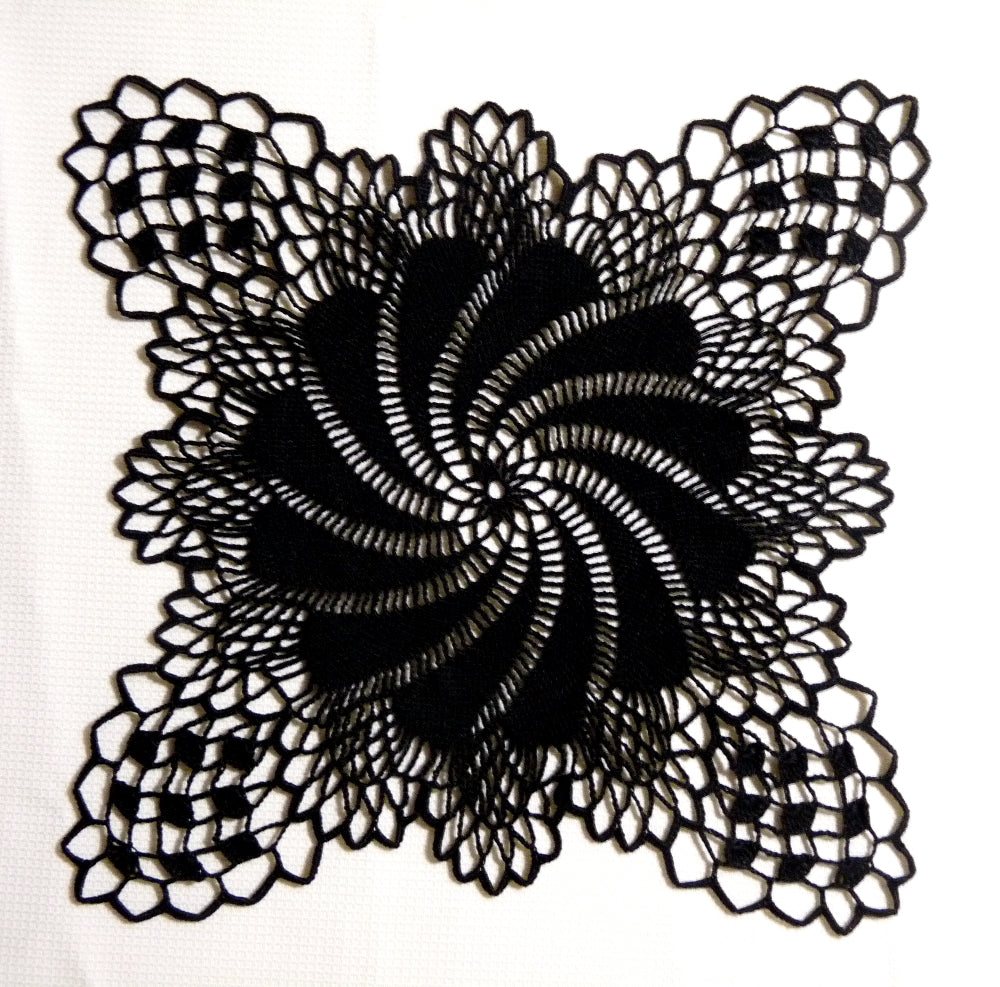 small square black crochet doily