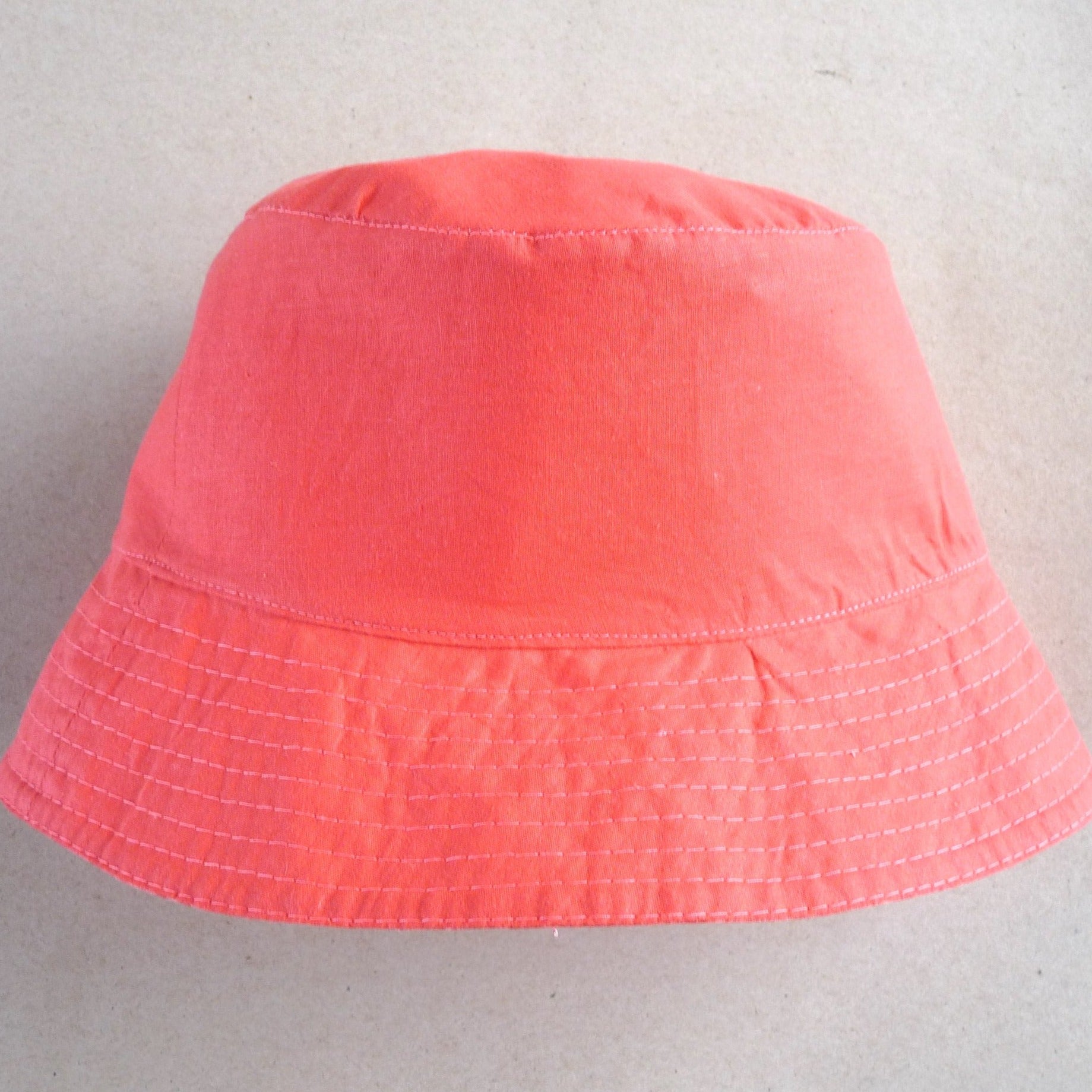 handmade cotton reversible bucket hat, light red