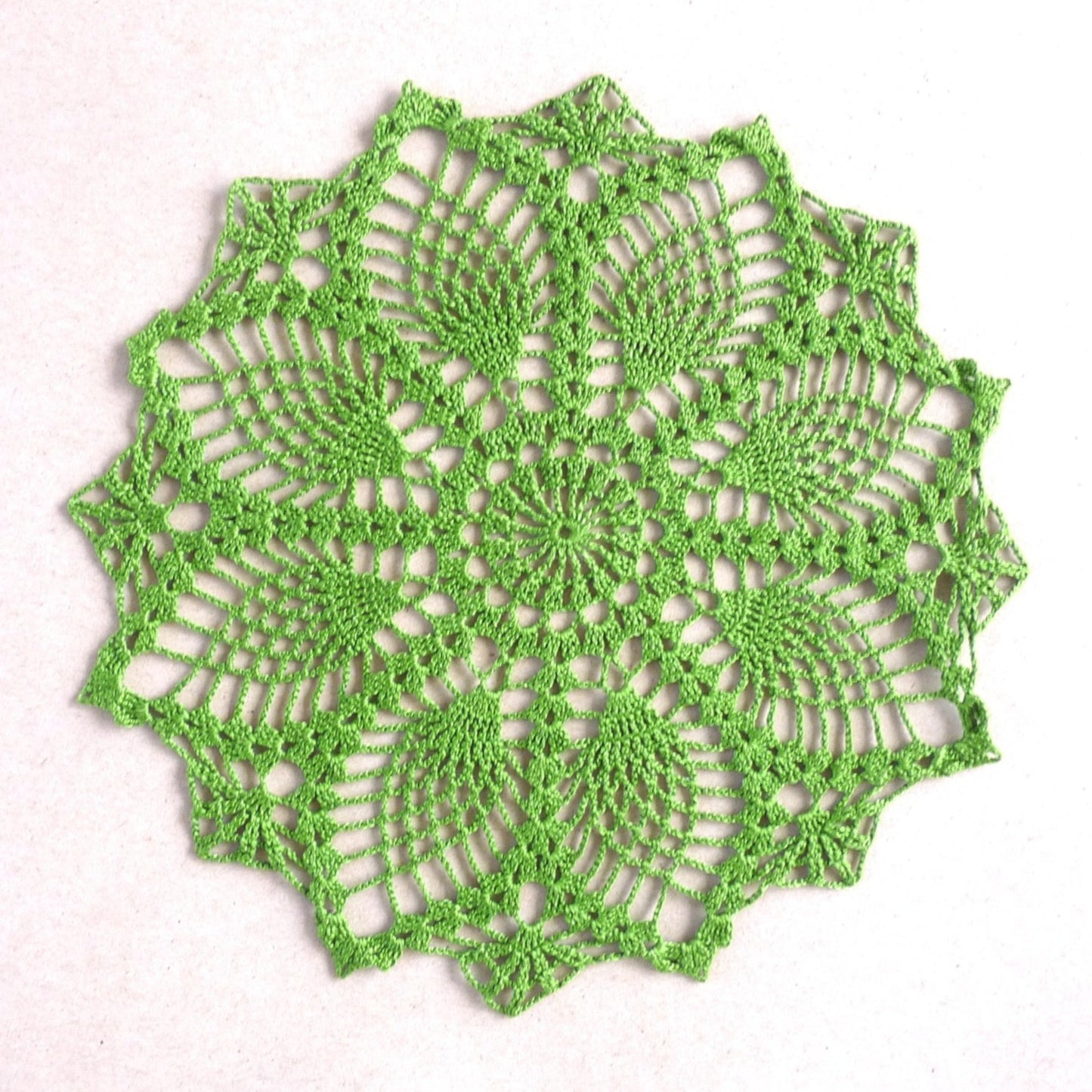 dark green small round pineapple crochet lace doily