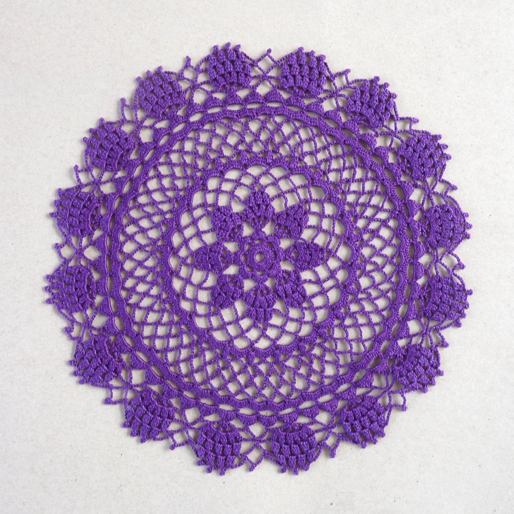 handmade dark purple small round crochet lace doily