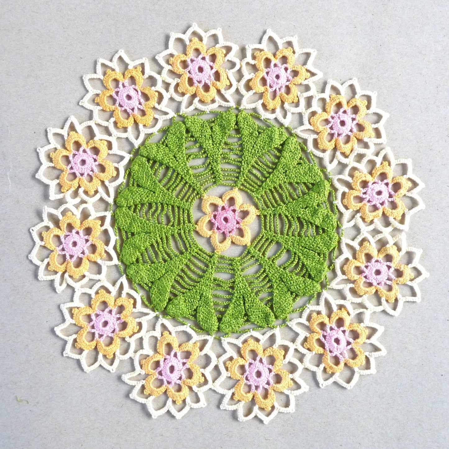 Handmade floral small round crochet lace decorative doily, centrepiece