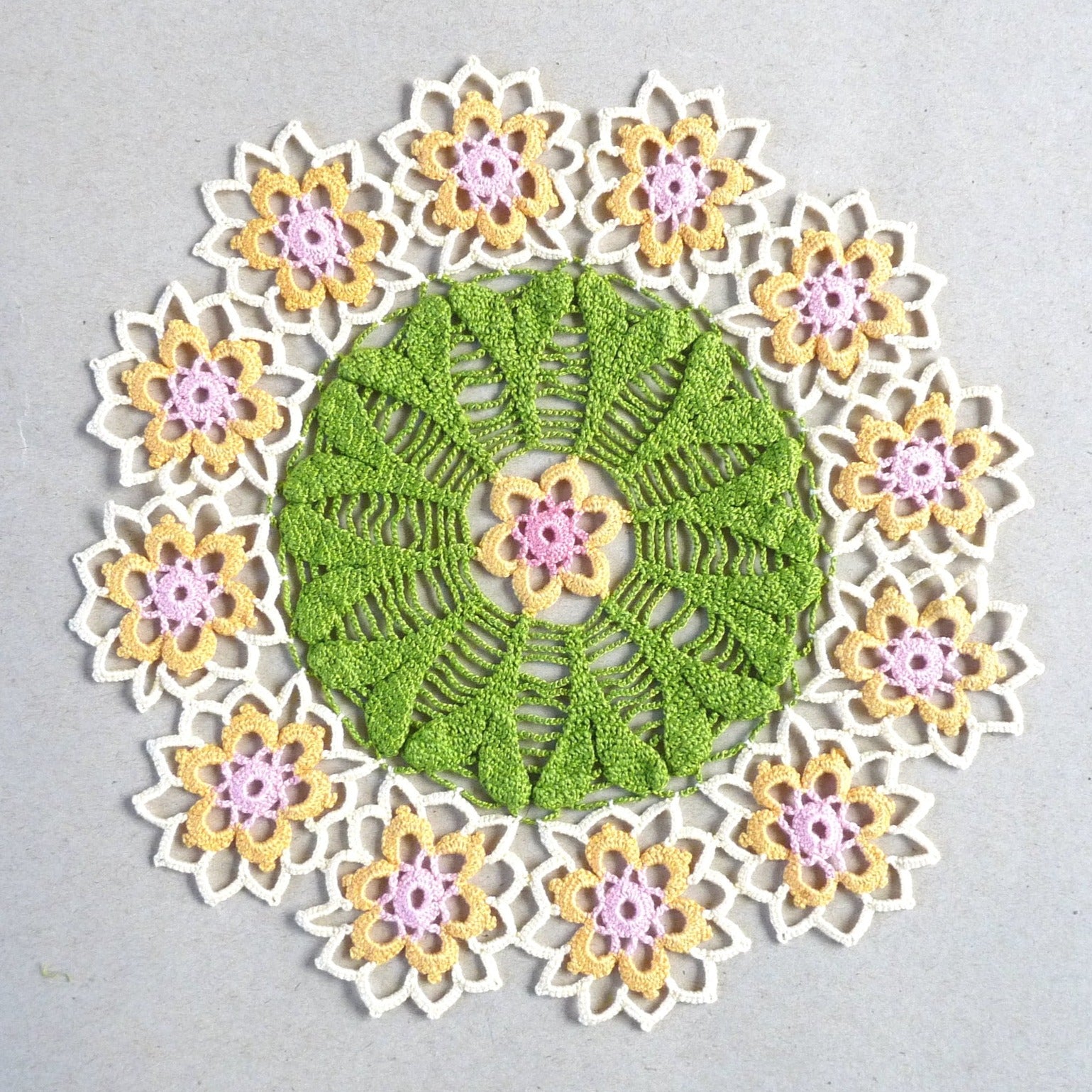 Handmade floral small round crochet lace decorative doily, centrepiece