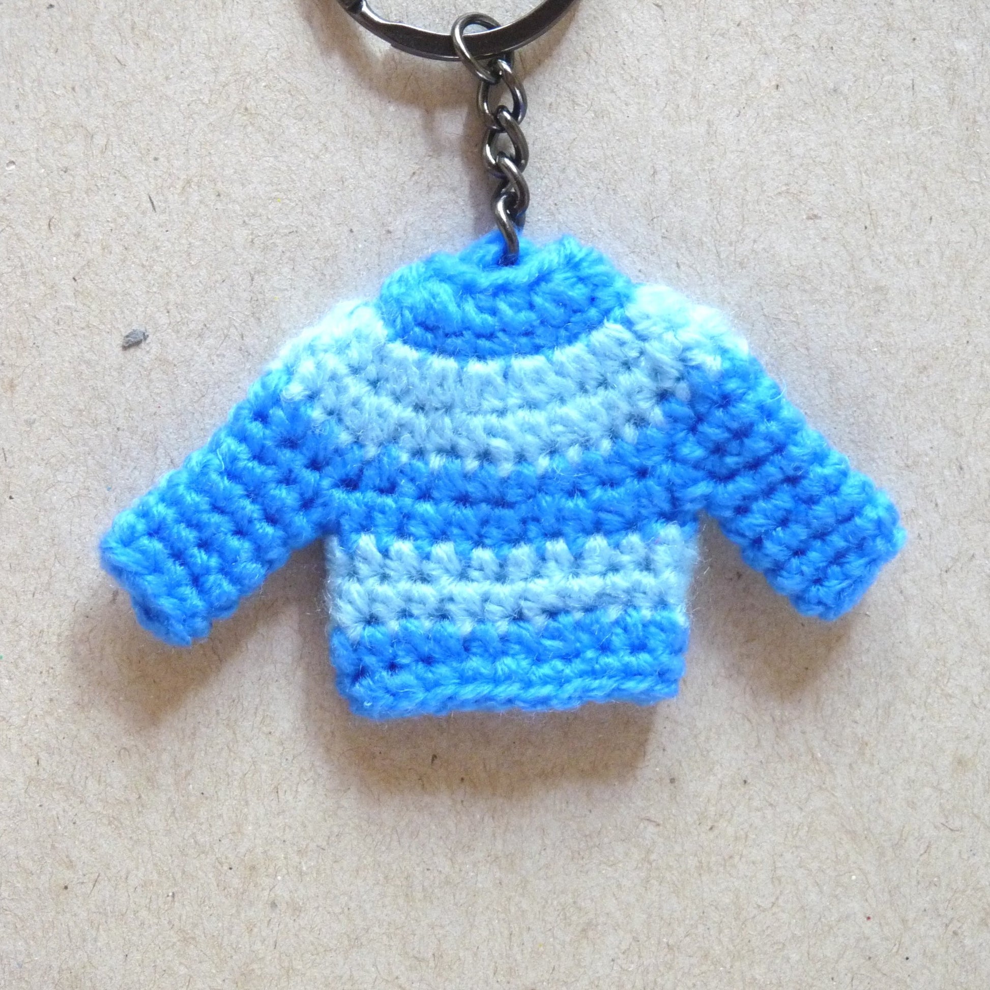 blue sweater crochet key tag