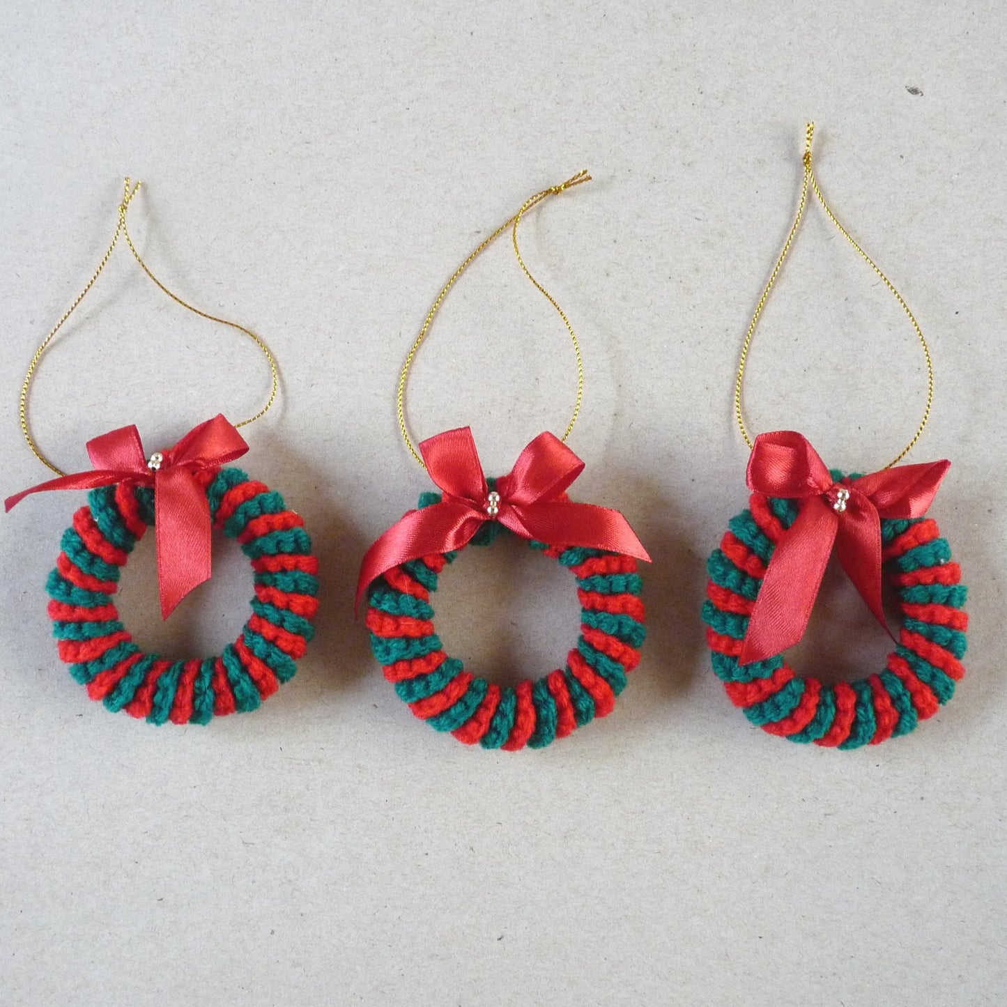 red and green crochet candy cane Christmas tree ornaments, set of 3