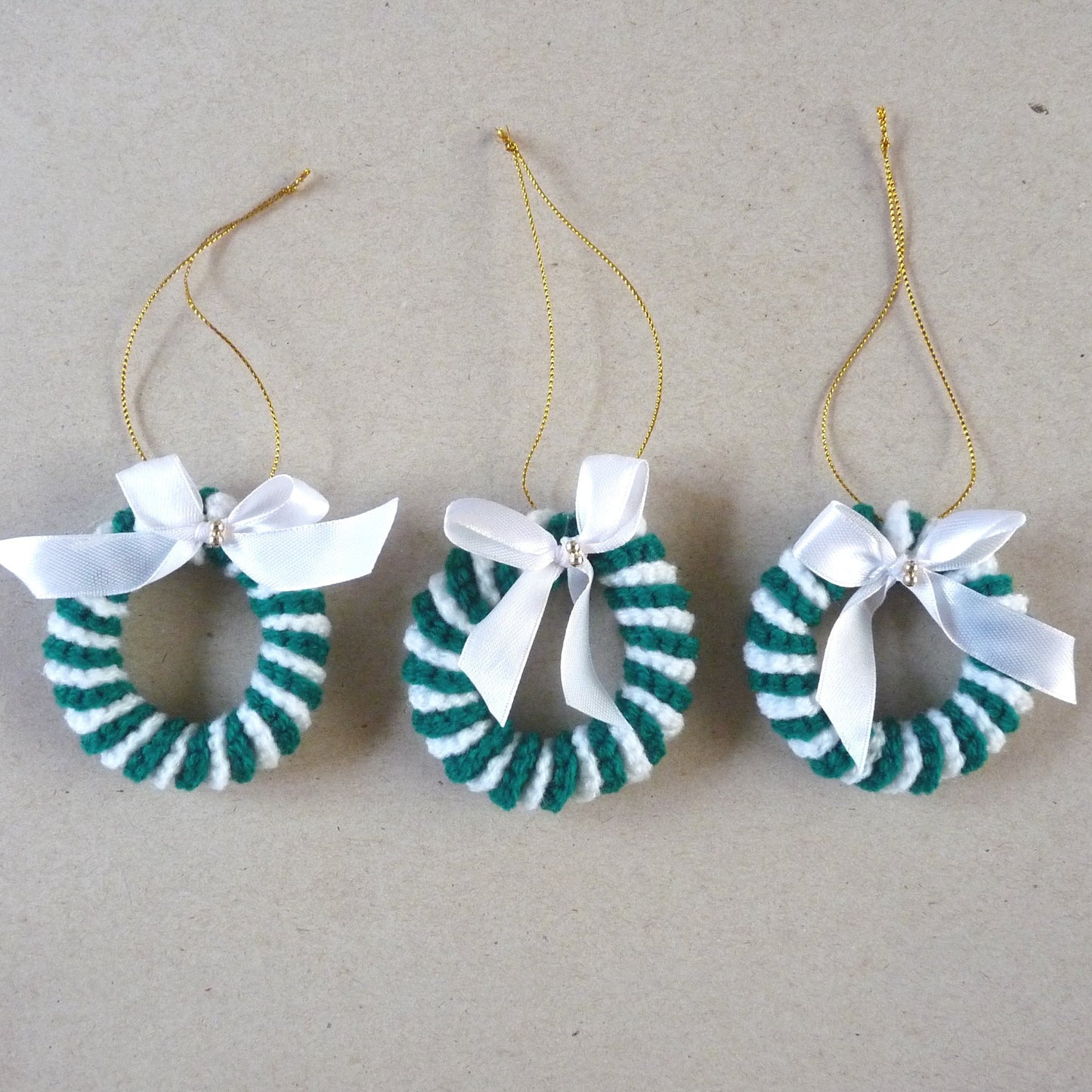 green and white crochet candy cane Christmas tree ornaments, set of 3