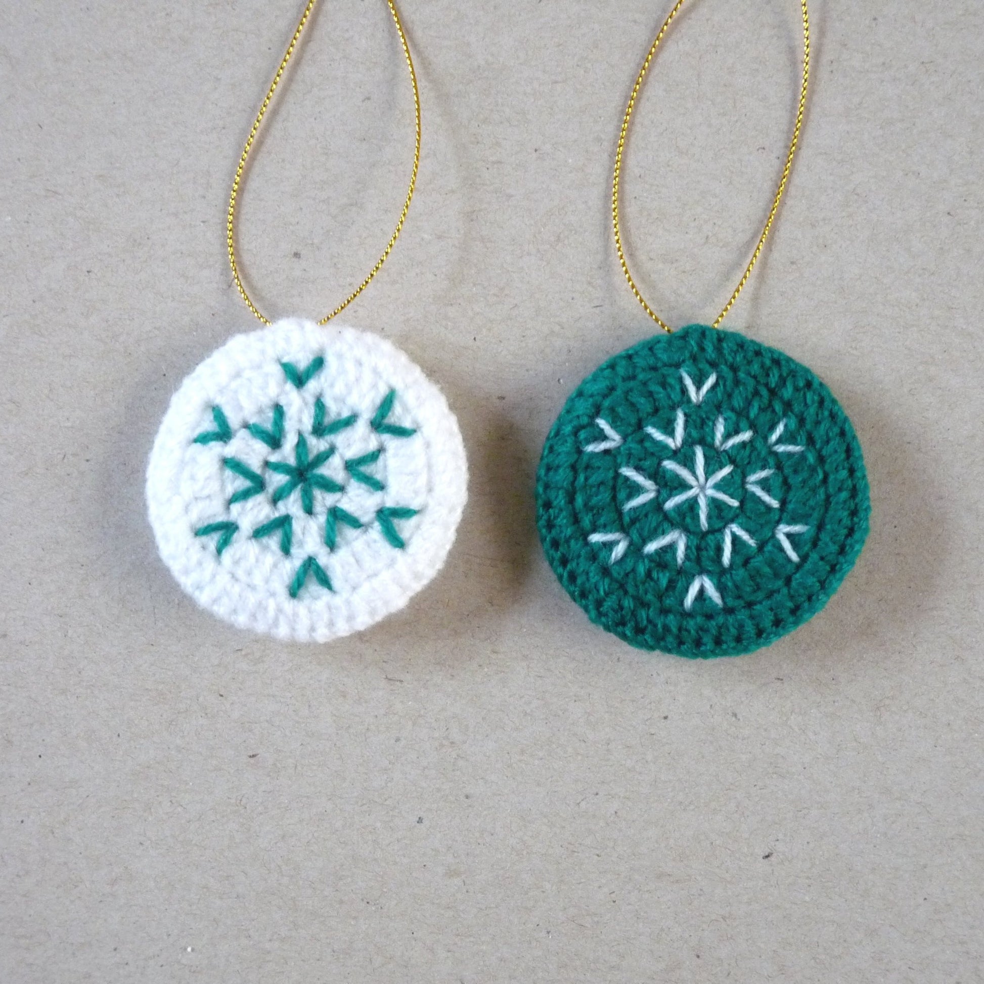dark green and white crochet Christmas tree ornaments, set of 2