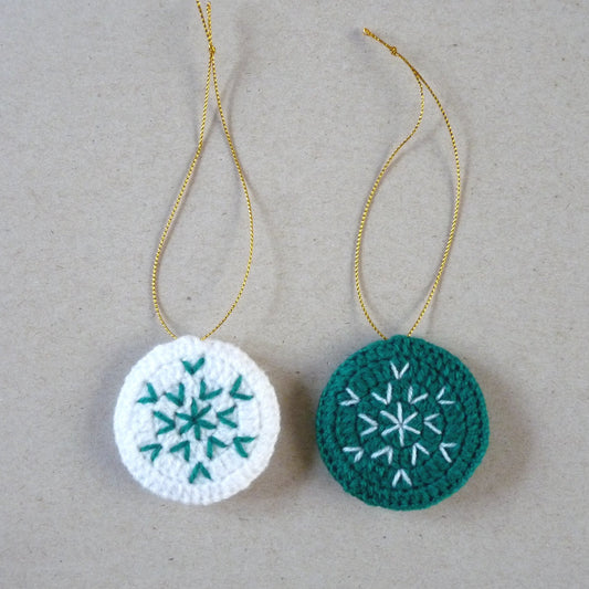 dark green and white crochet Christmas tree ornaments, set of 2