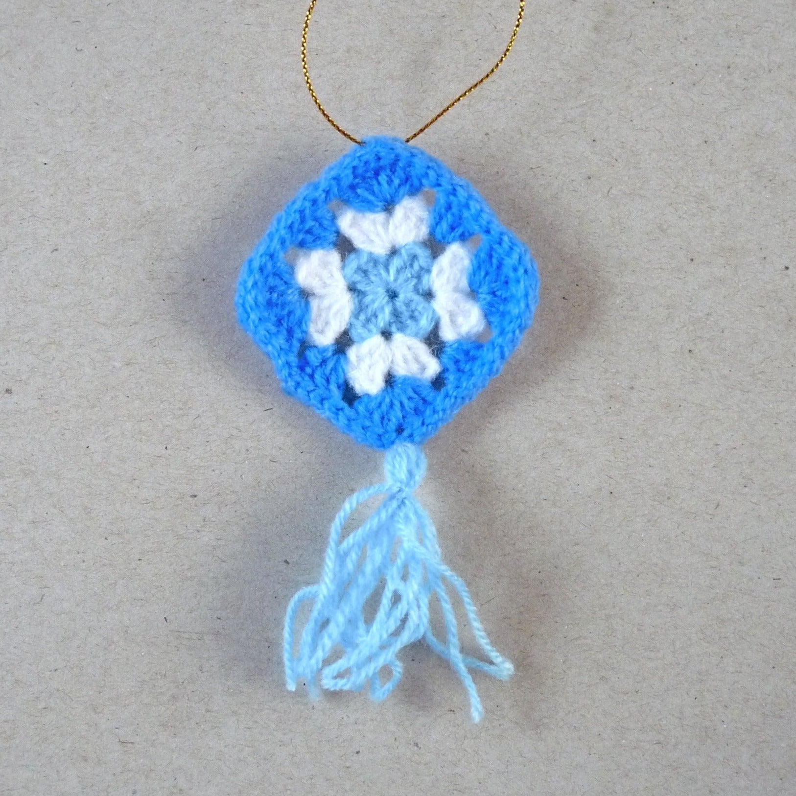 blue and white crochet granny square Christmas tree ornament