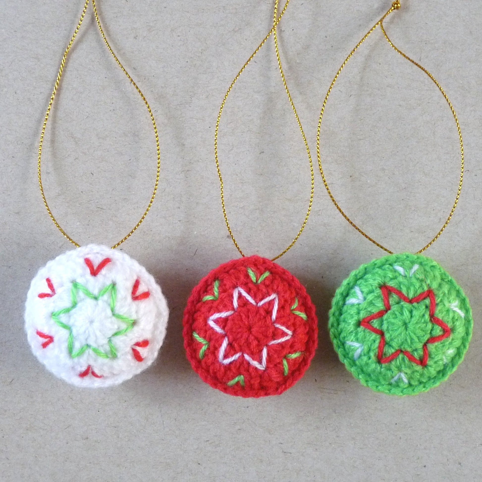 red green and white crochet Christmas tree ornaments, set of 3 baubles