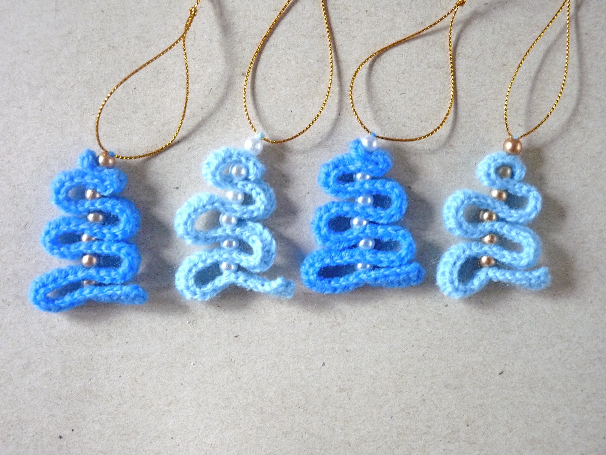 blue crochet Christmas tree ornaments set of 4