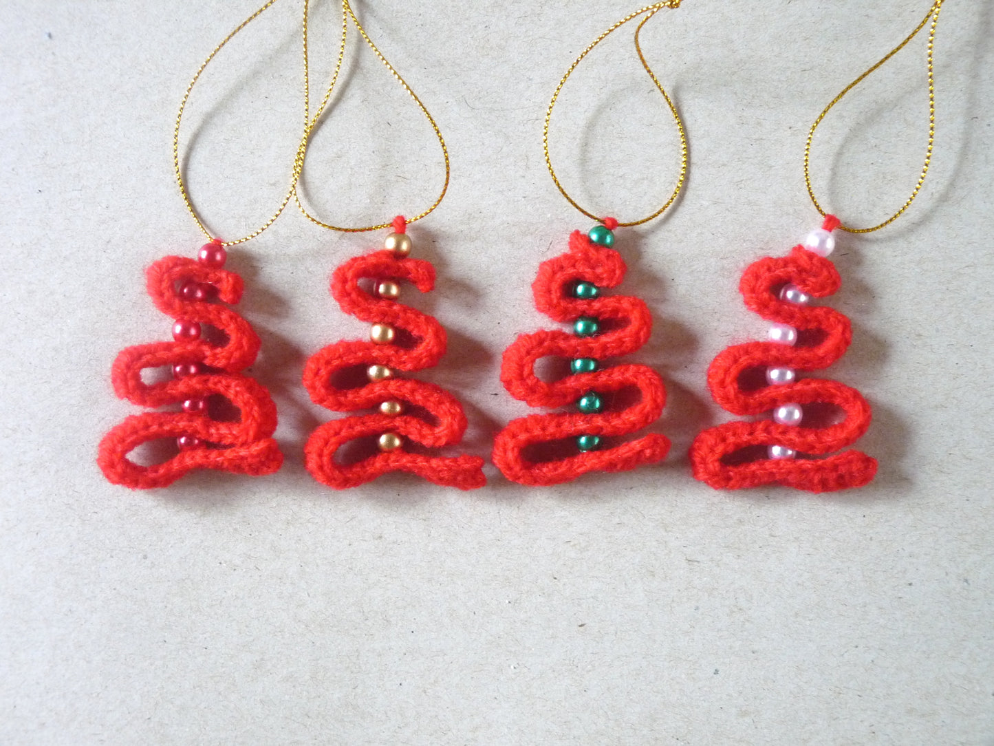 red crochet Christmas tree ornaments set of 4