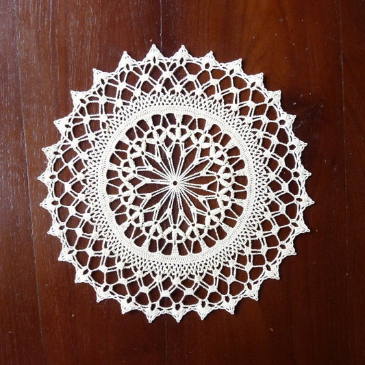 small cream round crochet doily