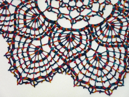 multicoloured large crochet lace doily