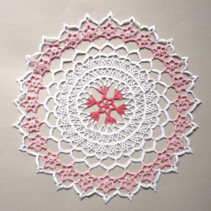 Pink and white round floral crochet lace centrepiece