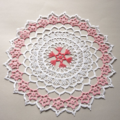 pink and white round large crochet lace floral doily