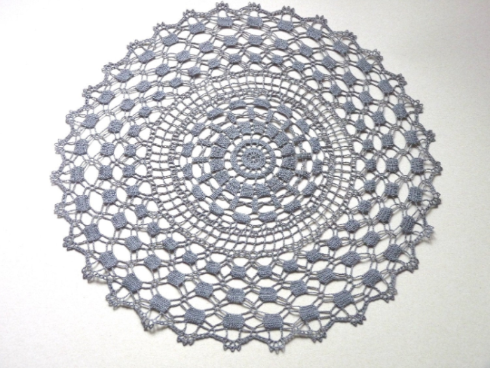 large round grey crochet lace centrepiece, doily