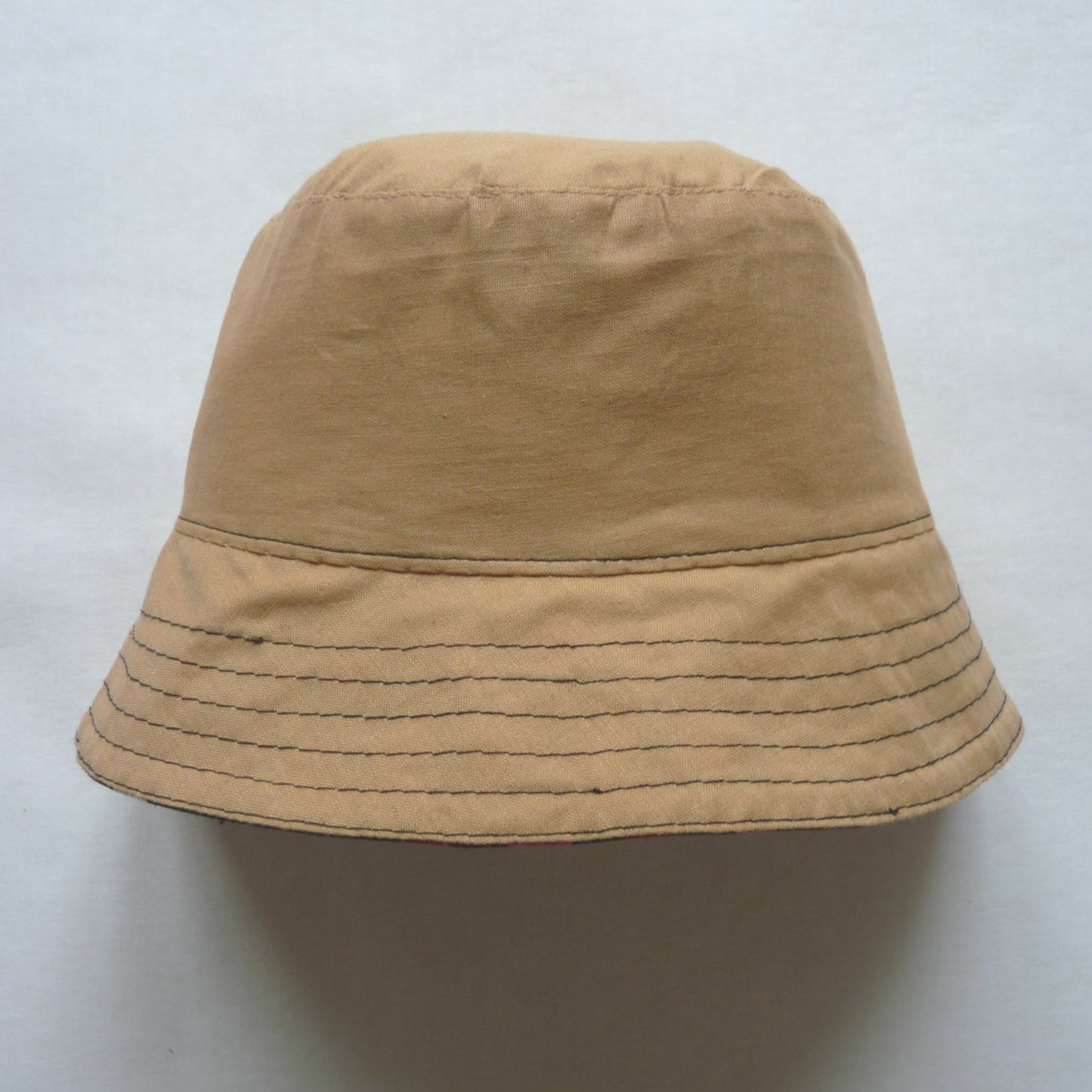 beige cotton reversible bucket hat