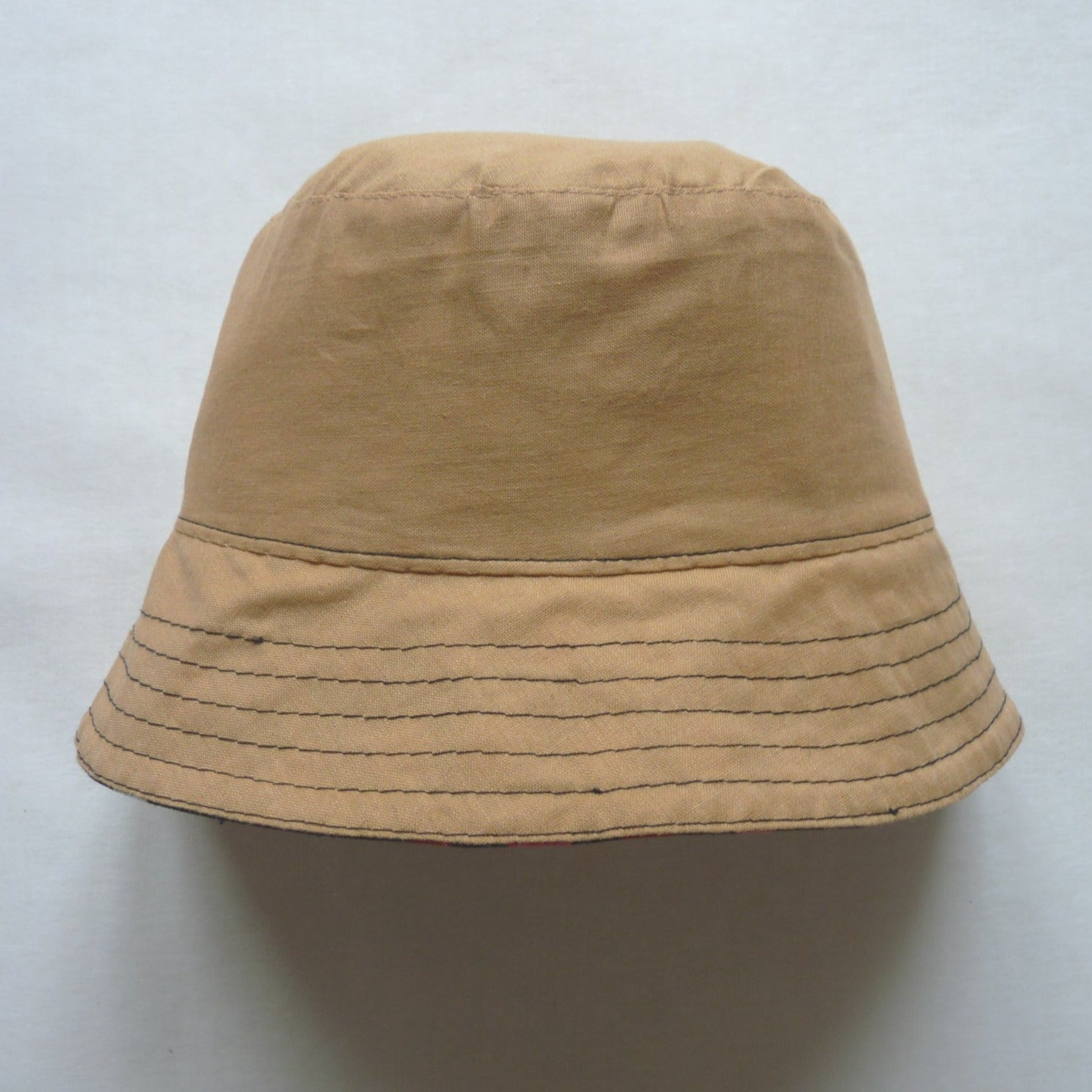 beige cotton reversible bucket hat