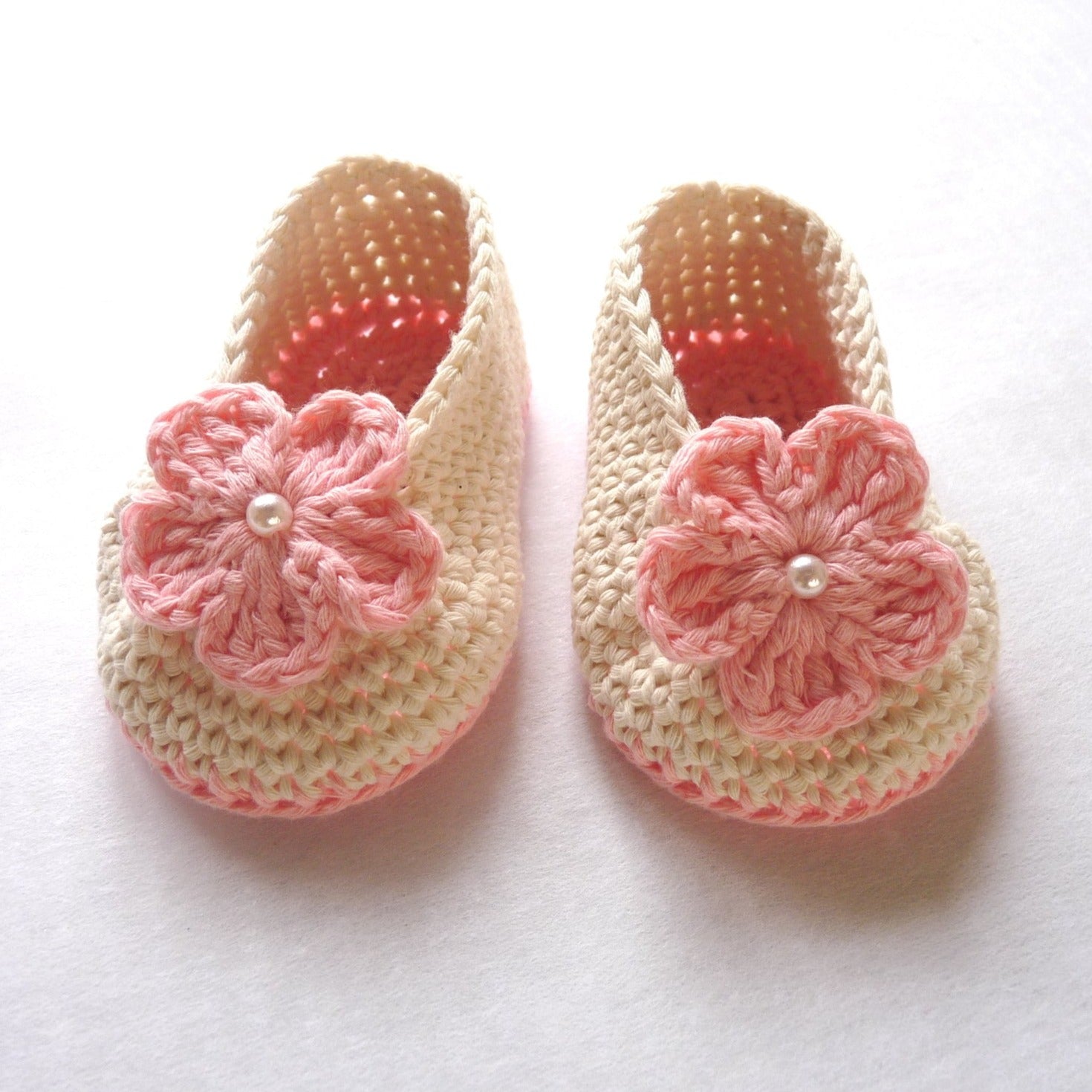 handmade crochet baby shoes for girls, pink and off-white