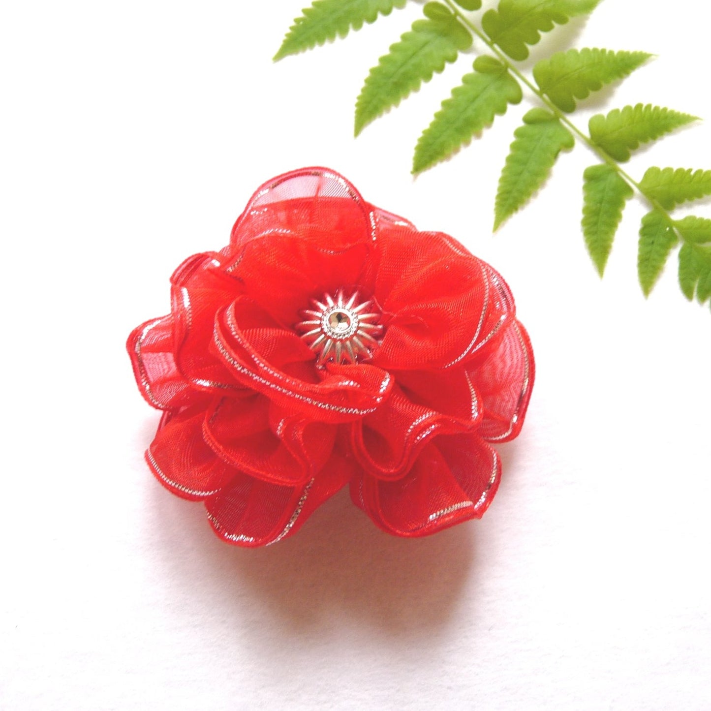 red and silver floral hair clip