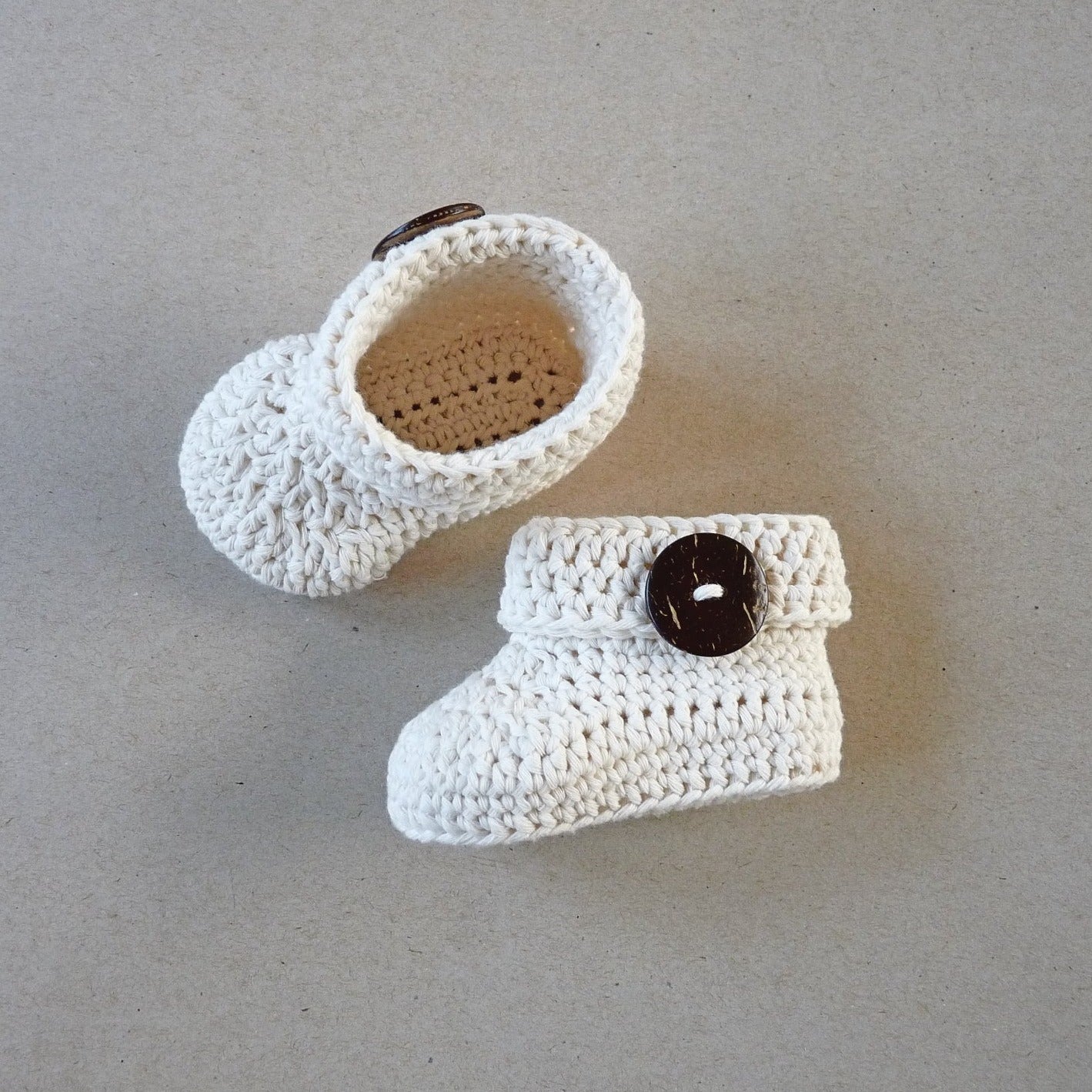 handmade crochet off white baby shoes for 6 to 12 month babies