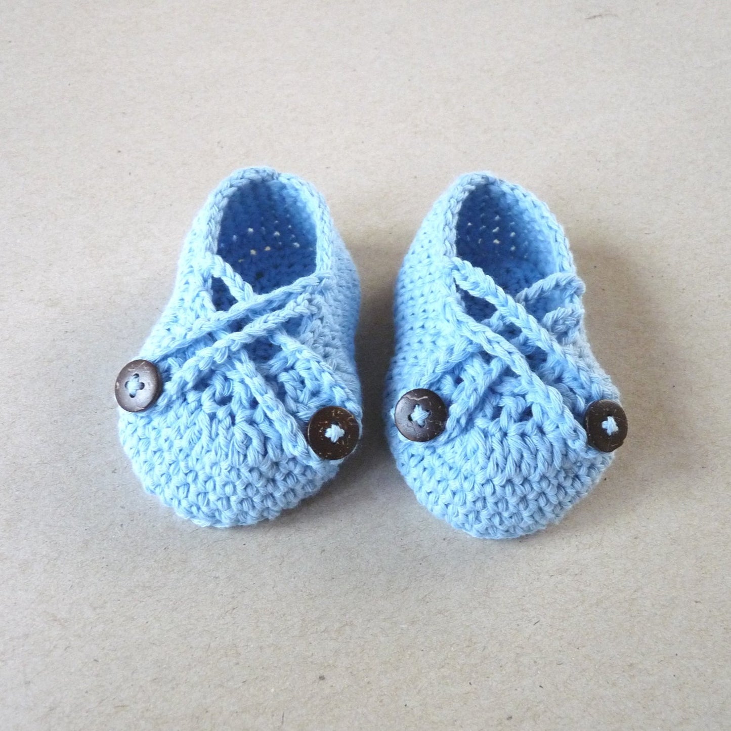 light blue handmade crochet baby shoes