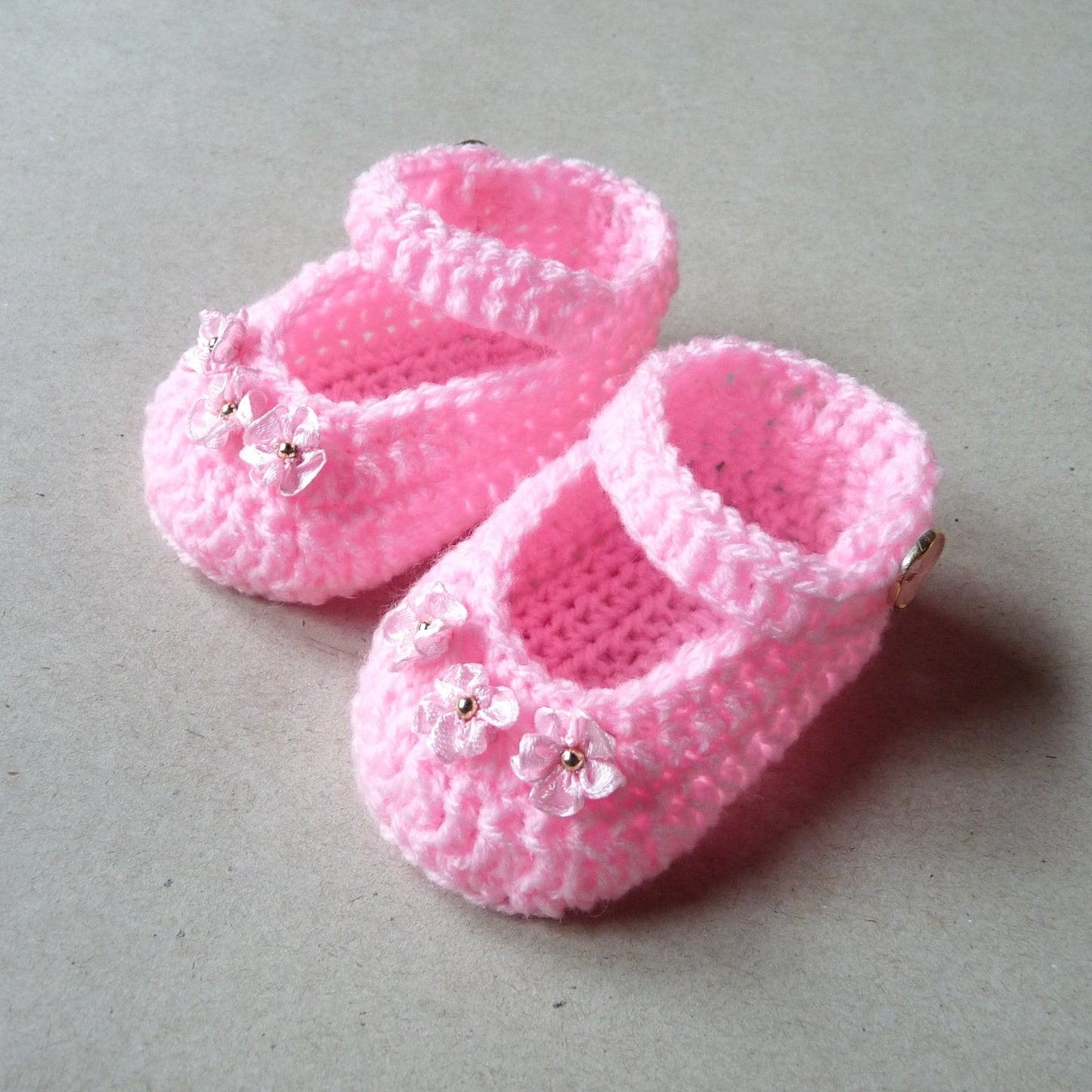 light pink crochet baby shoes/ booties with satin ribbon flowers for girls