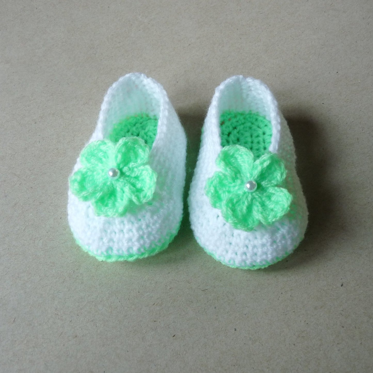 light green and white crochet baby shoes with flowers for girls